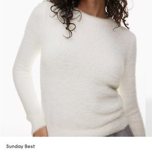 Aritzia- Sunday Best fuzzy sweater in white.